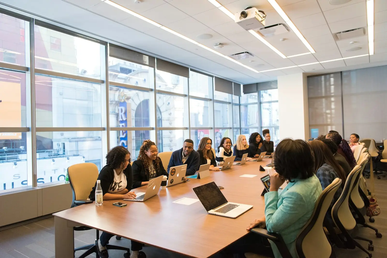 A team of professionals around a boardroom table